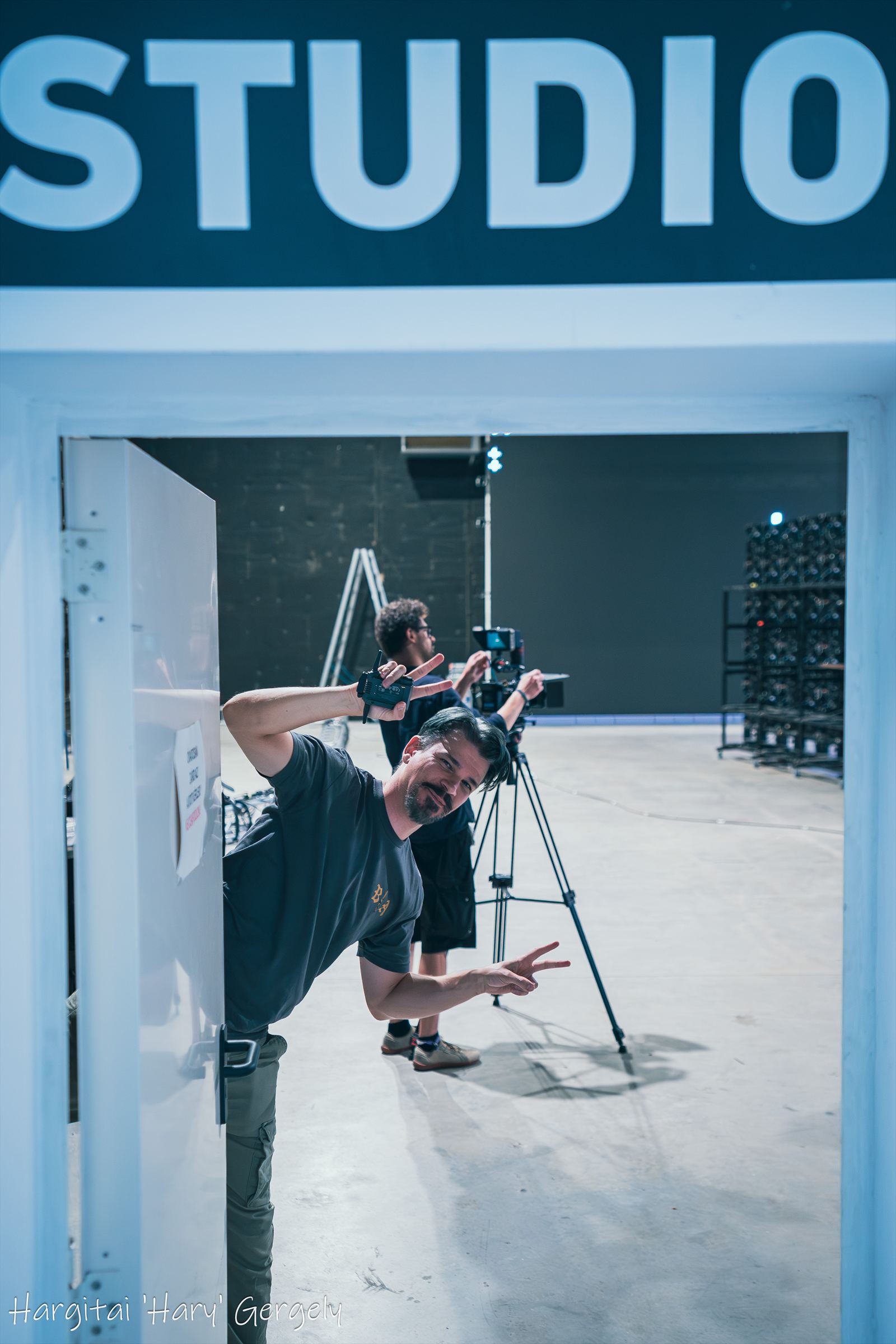 Crew members at the studio stage door